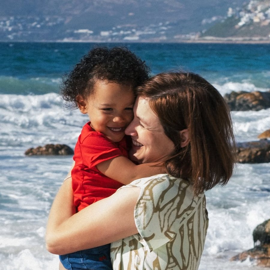 Carla Glen with her daughter on a Cape Town beach